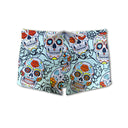 Costume da mare parigamba BAMBINO Boneswimmer Tobago Teschi Messico - modello L021TOF, on grafiche di teschi in stile messicano ed elmenti floreali su fondo azzurro