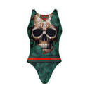 Costume da allenamento nuoto Boneswimmer per bambina, modello intero PINUP 414pf con stampa di un teschio glamour tra rose verde scuro, dettagli rossi e decorazioni dorate, fronte