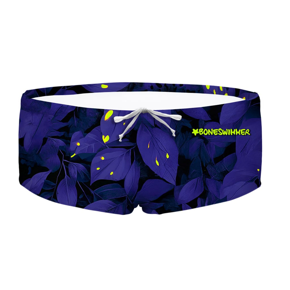 Costume da allenamento nuoto in piscina Boneswimmer da uomo, modello parigamba UCLA GLOW con un fogliame notturno macchiato di giallo neon; fronte