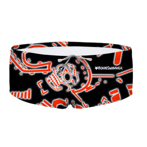 Costume da allenamento nuoto in piscina Boneswimmer da uomo, modello parigamba UCLA 206UF TESCHIO NEON con grafica teschio stilizzato arancione neon su sfondo nero; fronte