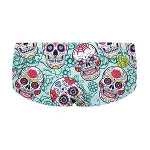 Costume da allenamento nuoto in piscina Boneswimmer da uomo, modello parigamba UCLA 208UF TESCHI MEX con motivo teschi floreali in stile Día de Muertos con colori accesi su sfondo celeste; retro