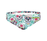 Costume da allenamento nuoto in piscina Boneswimmer da uomo, modello slip H2OTTO 387HF TESCHI MEX con grafica teschi messicani e fiori colorati su sfondo bianco; fronte