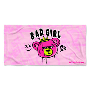Telo mare piscina Boneswimmer in microfibra rosa con orsetto corona e scritta Bad Girl.