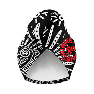 Turbante asciugacapelli Sahara in microfibra, modello 025S SKEL con disegni tribali bianchi su sfondo nero, vista frontale